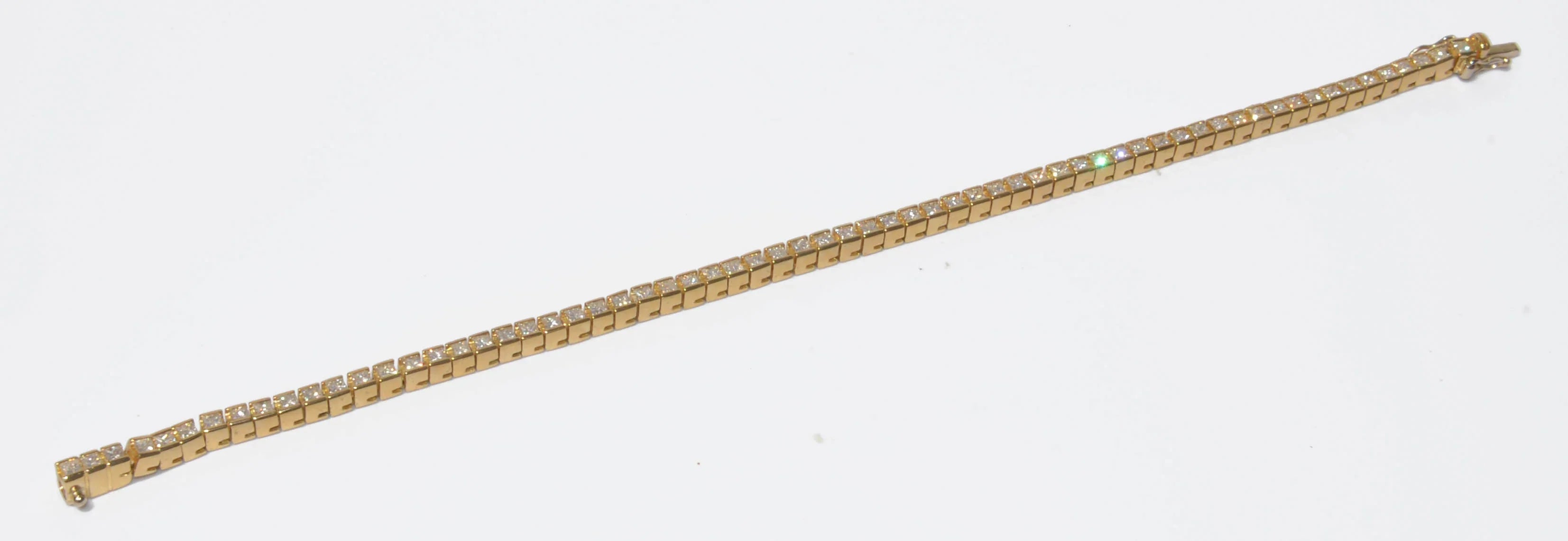 Princess-cut diamond yellow gold tennis bracelet