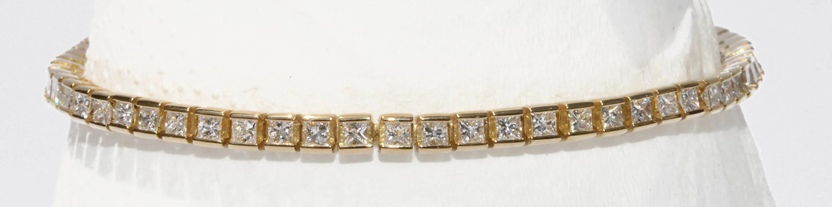 Princess-cut diamond yellow gold tennis bracelet