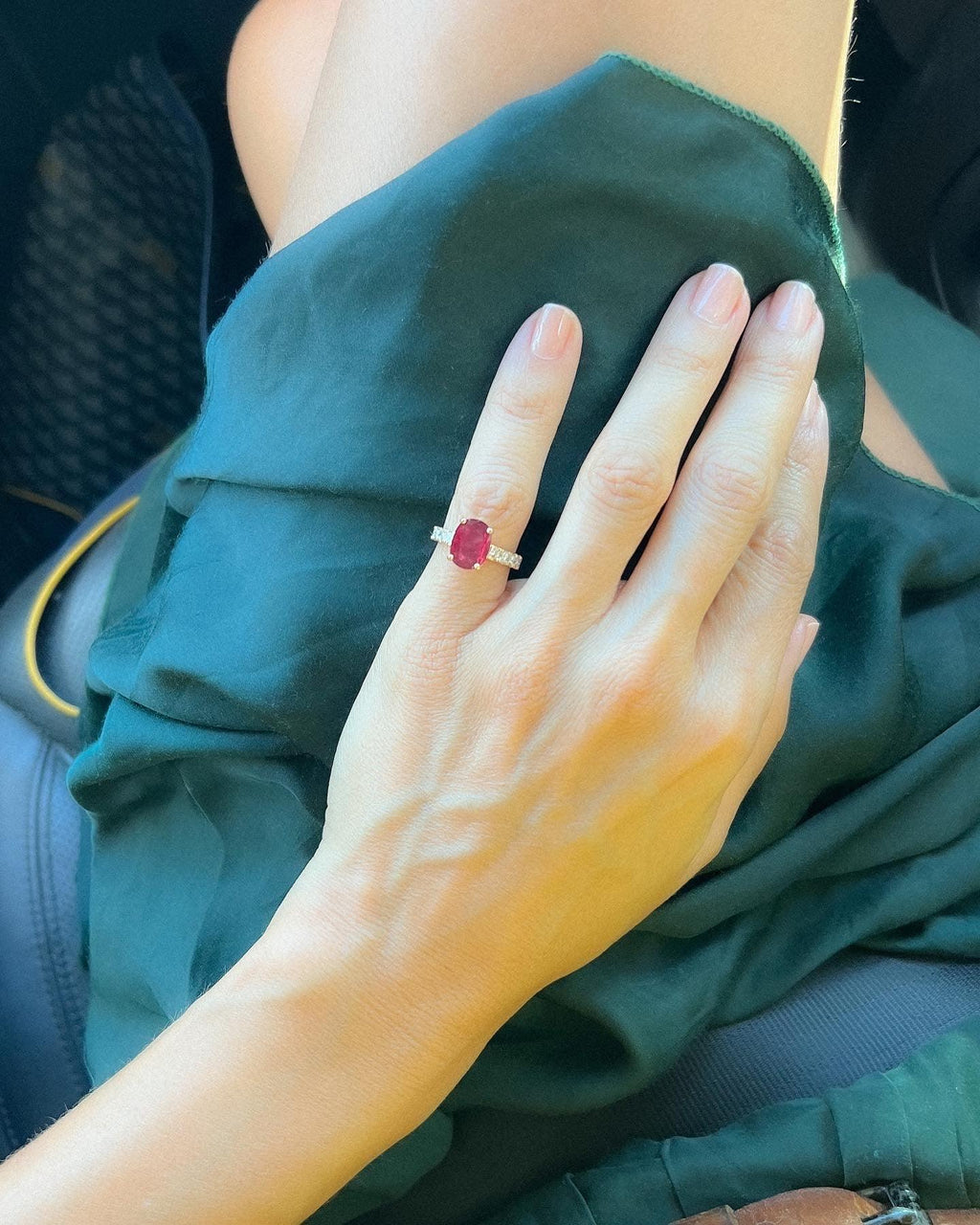 Yellow gold ring with ruby and princess cut diamonds