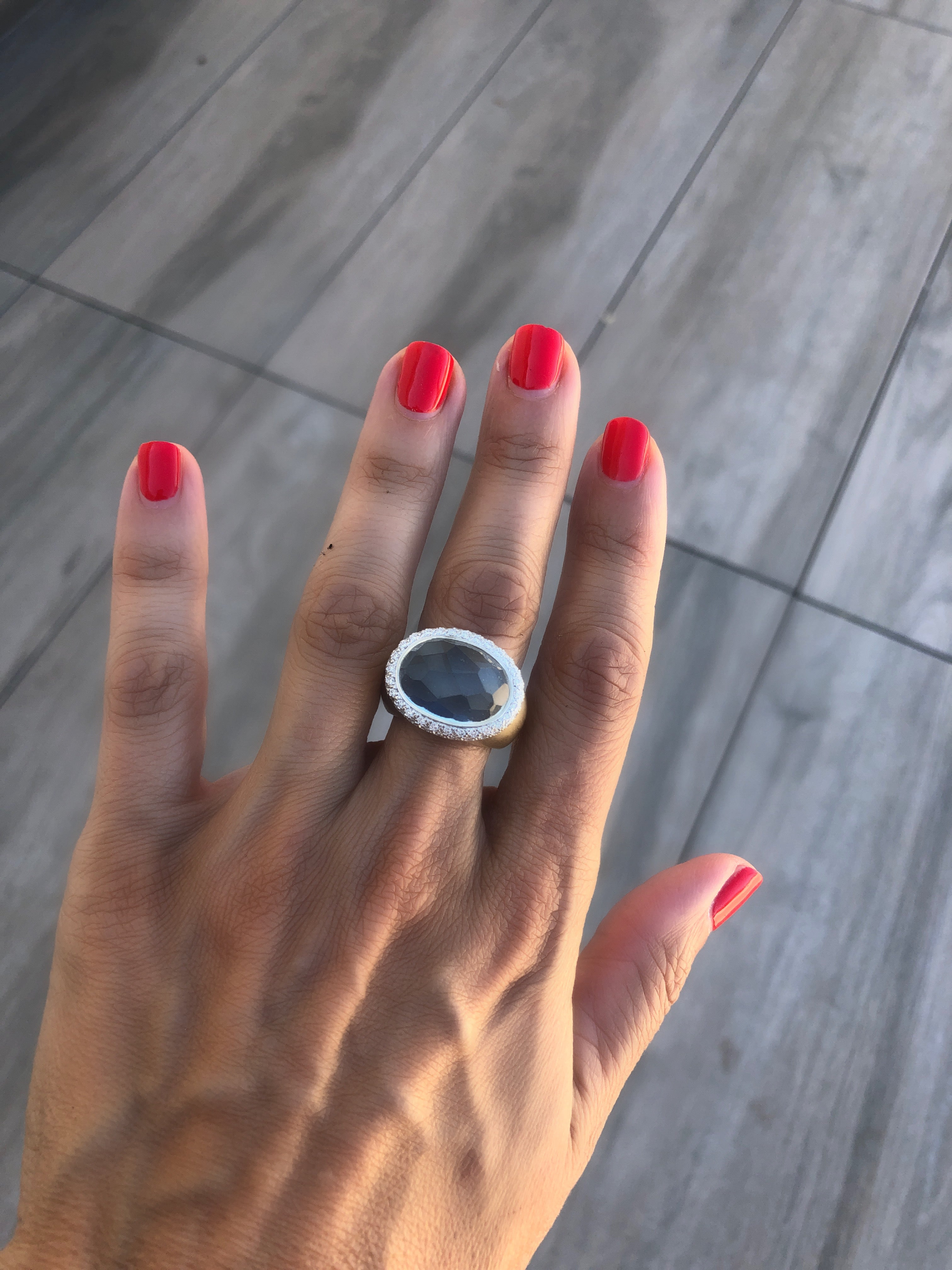 Pomellato Italian designer pink gold frosted ring set with an aquamarine