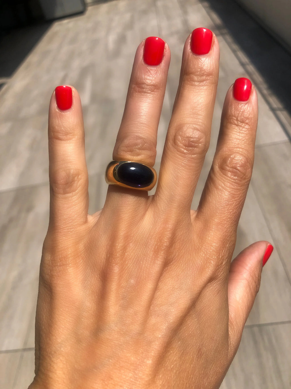 Ring signed by the house of Pomellato in yellow gold and cordierite