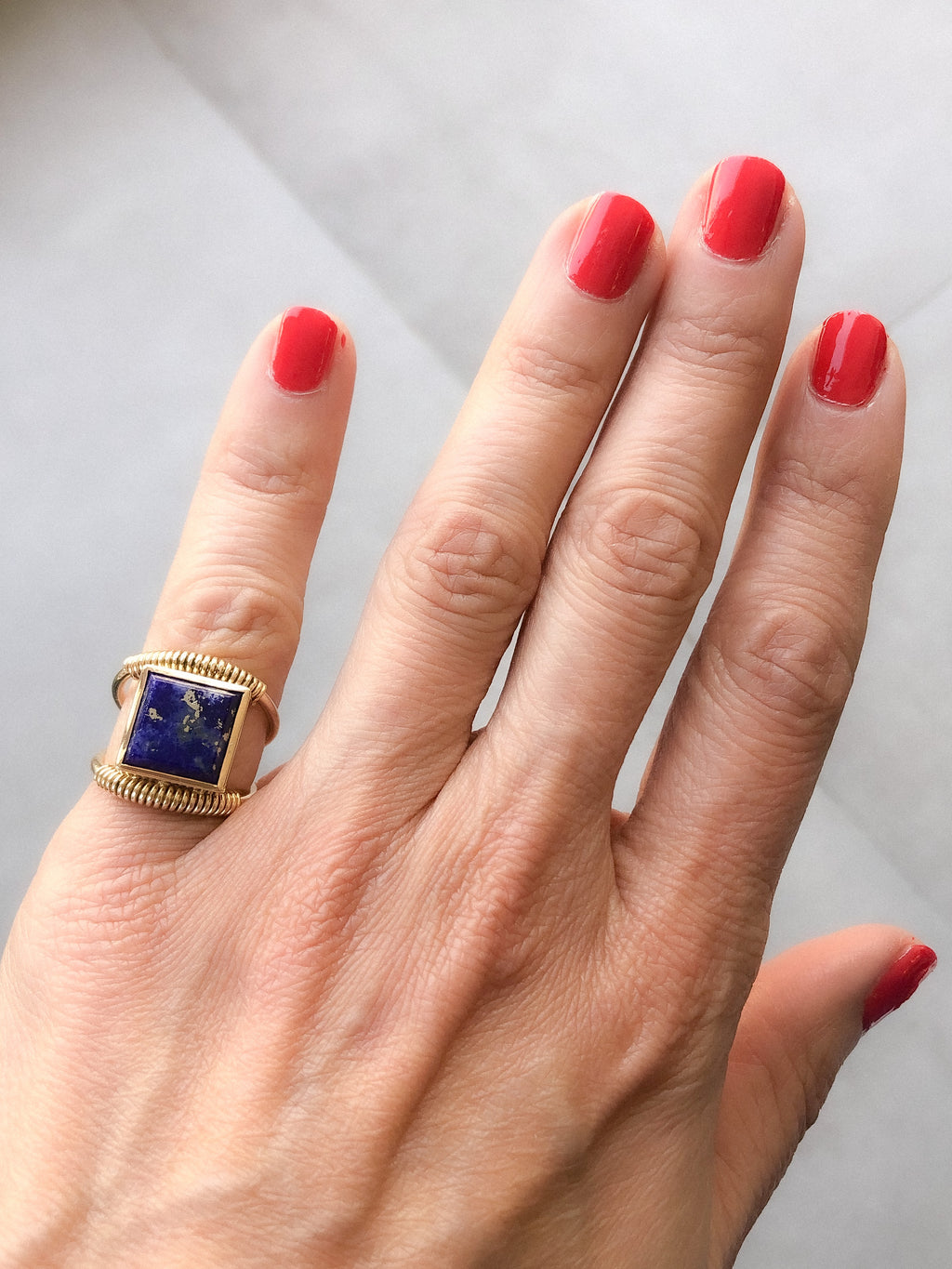 Etruscan gold and lapis ring