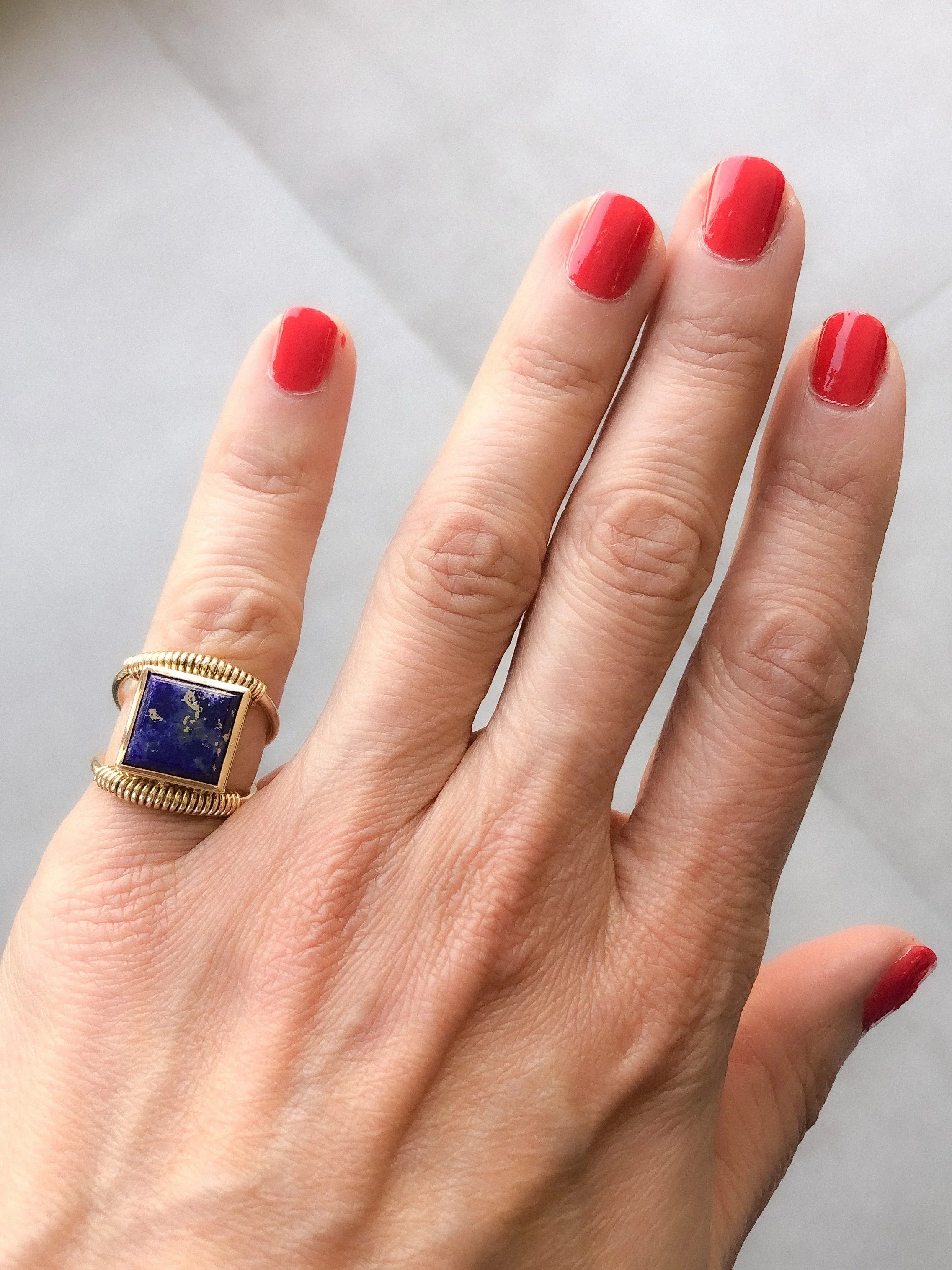Etruscan gold and lapis ring