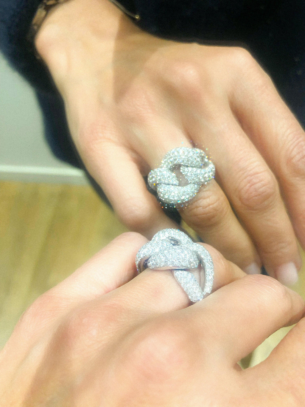 Paved diamond curb chain ring in white gold