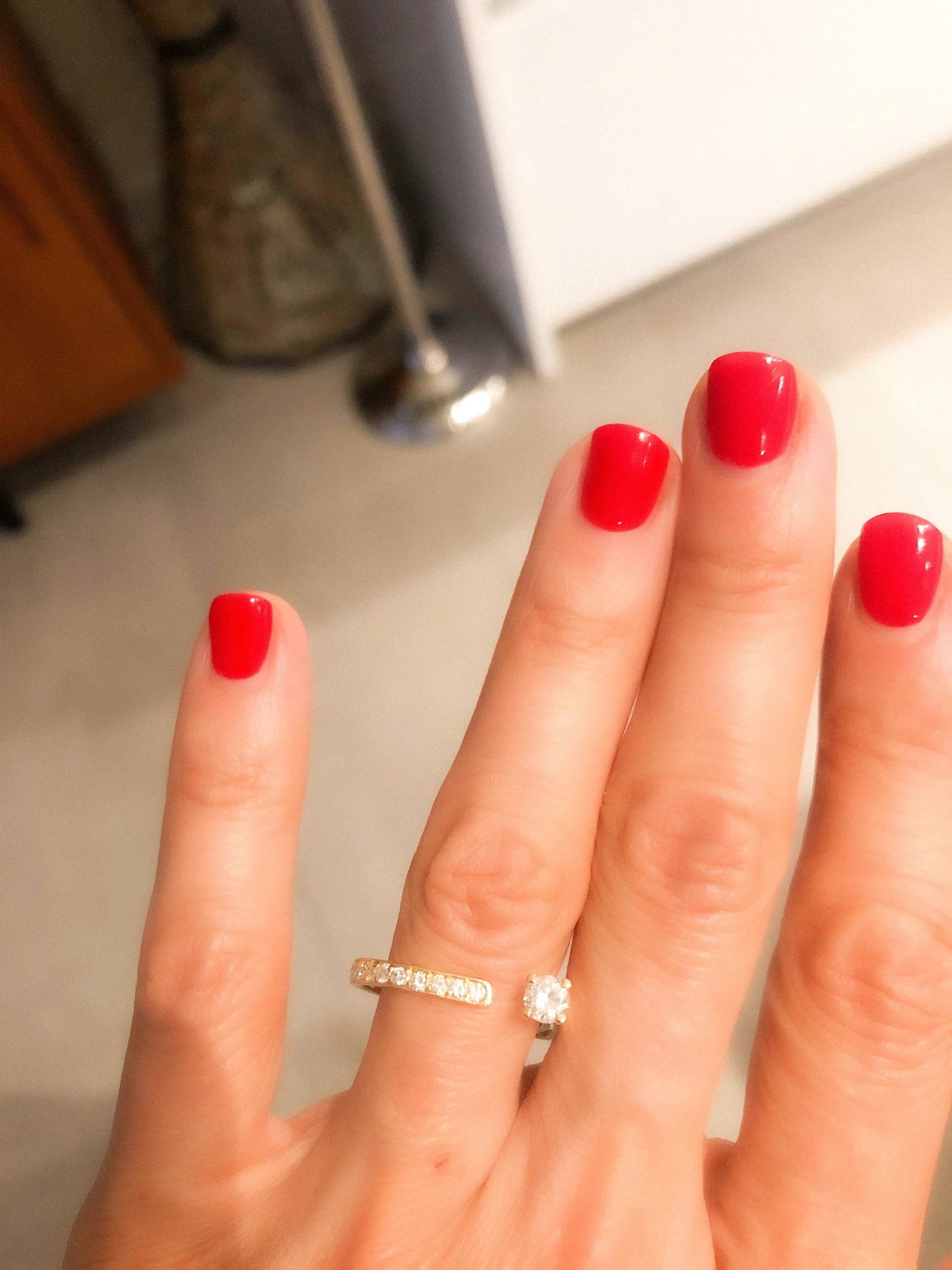 Open yellow gold and diamond design ring