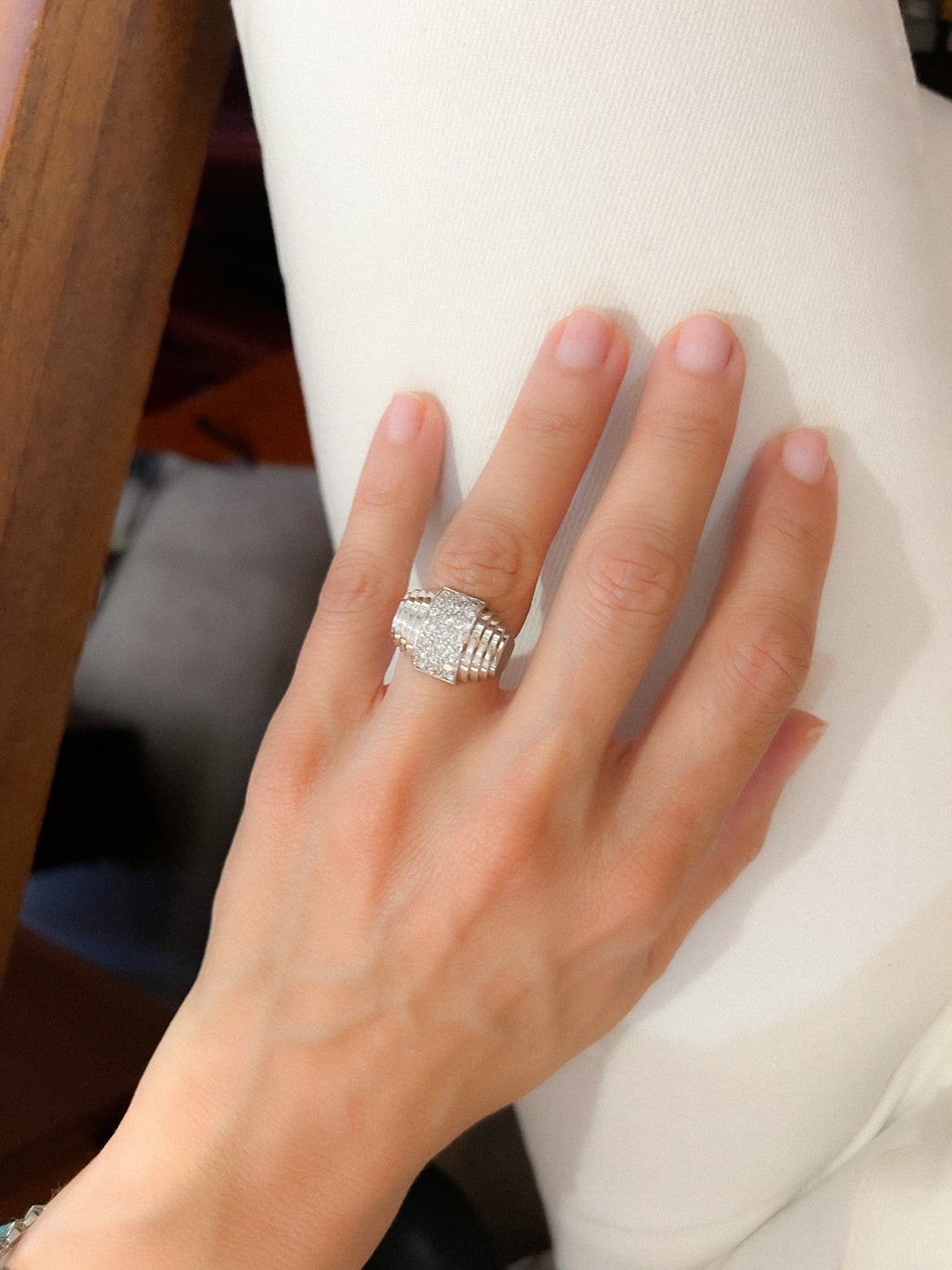 Platinum and tiered diamond ring