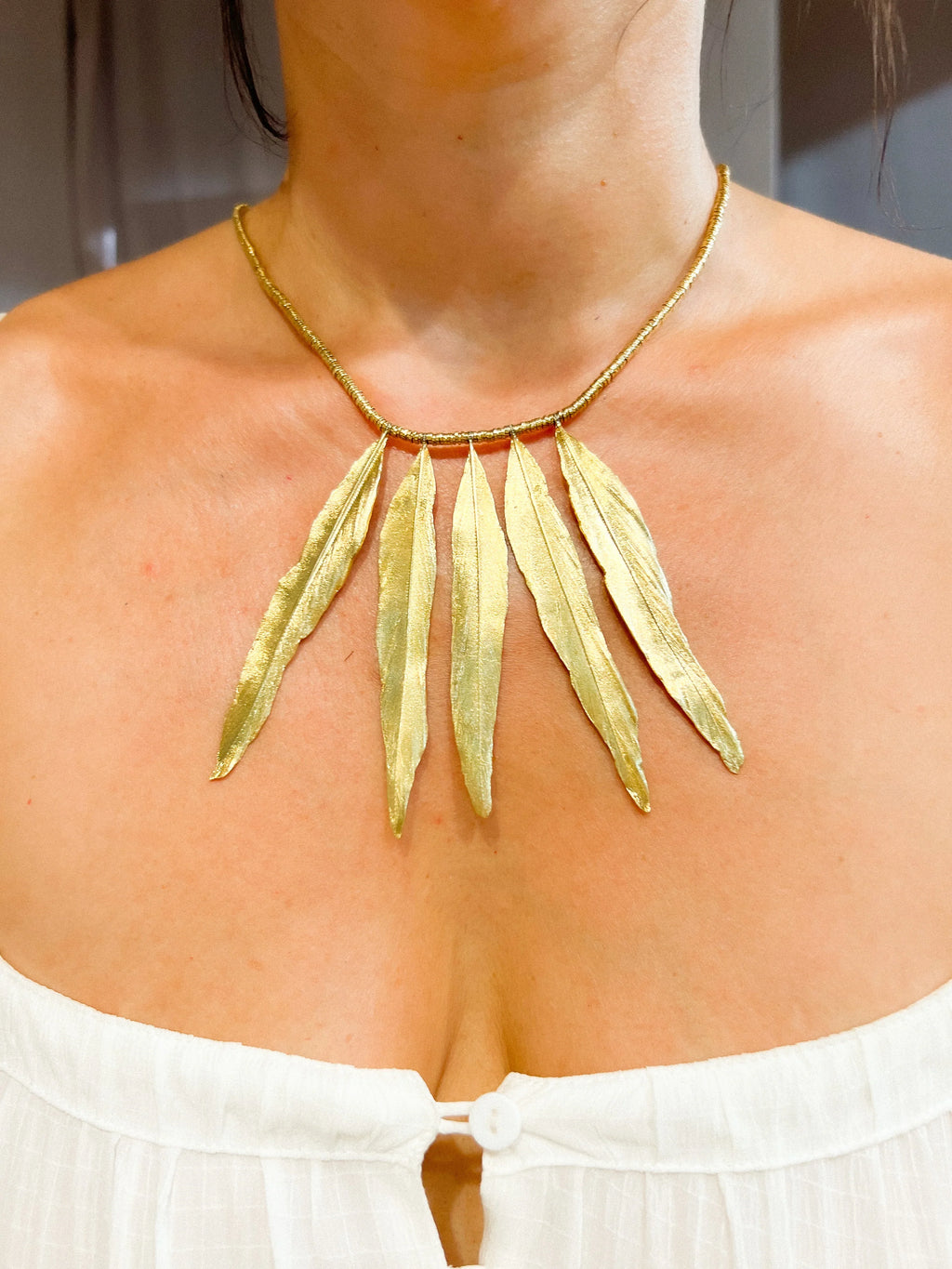 H.Stern gold necklace forming gold feathers