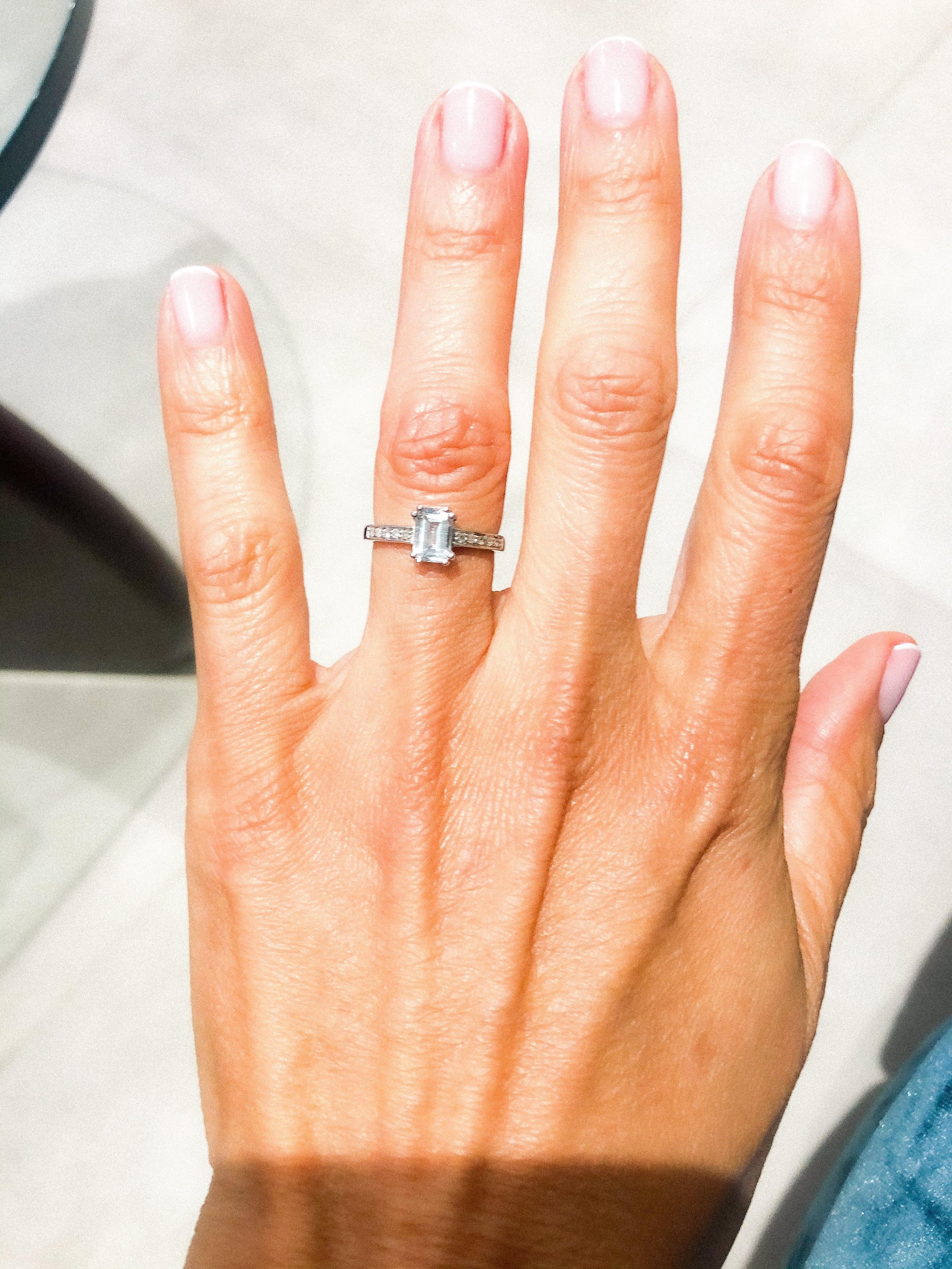 Rectangular ring adorned with an aquamarine