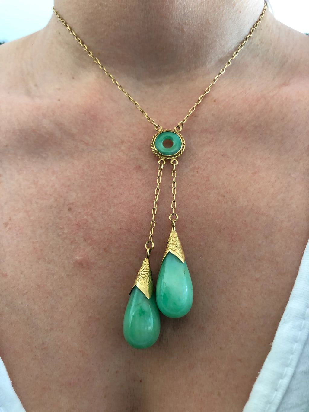 Yellow gold tassel necklace with jade beads