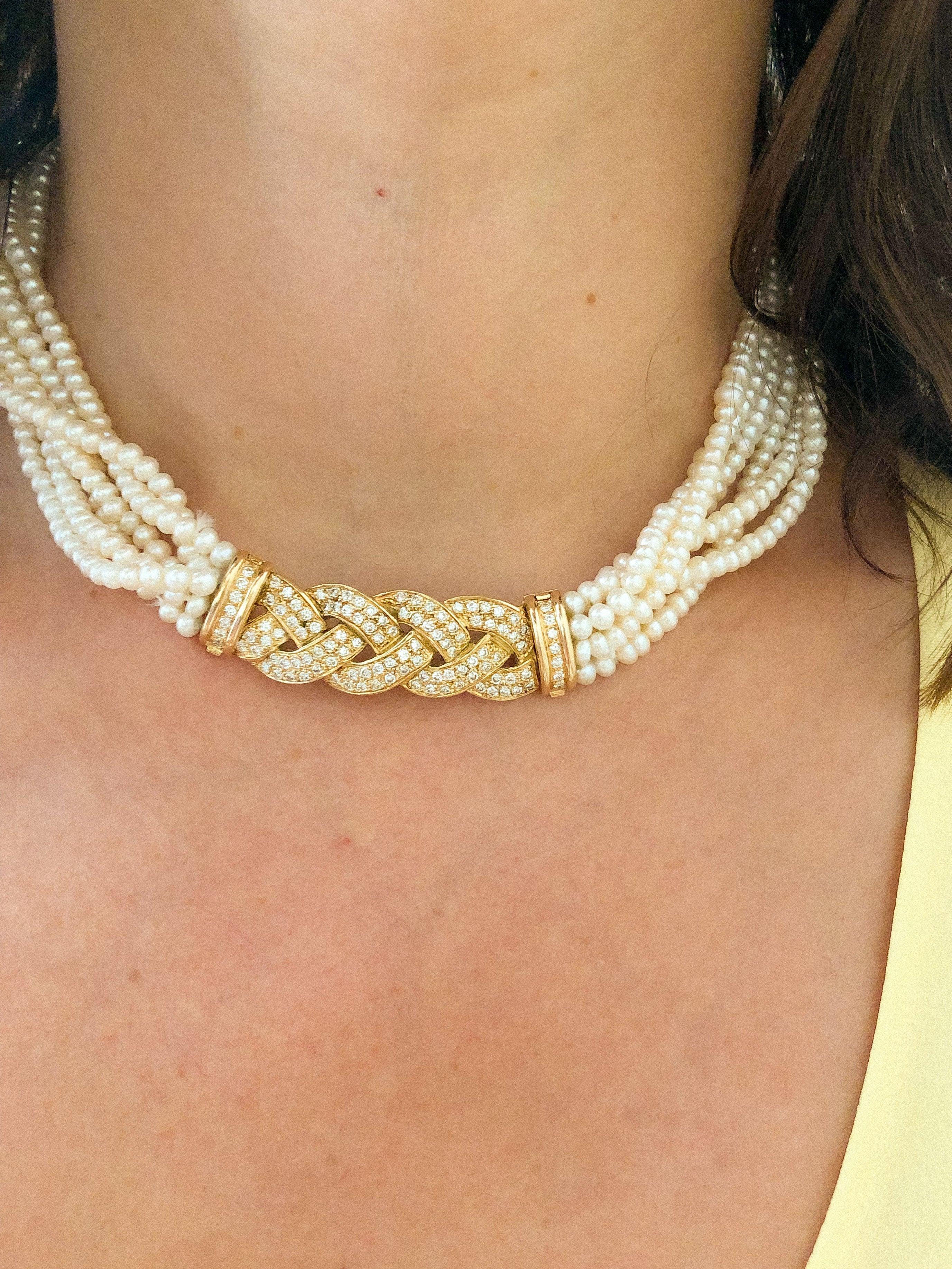 Multi-strand pearl necklace with diamond clasp