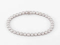 Bracelet en or gris et diamants tennis serti tennis