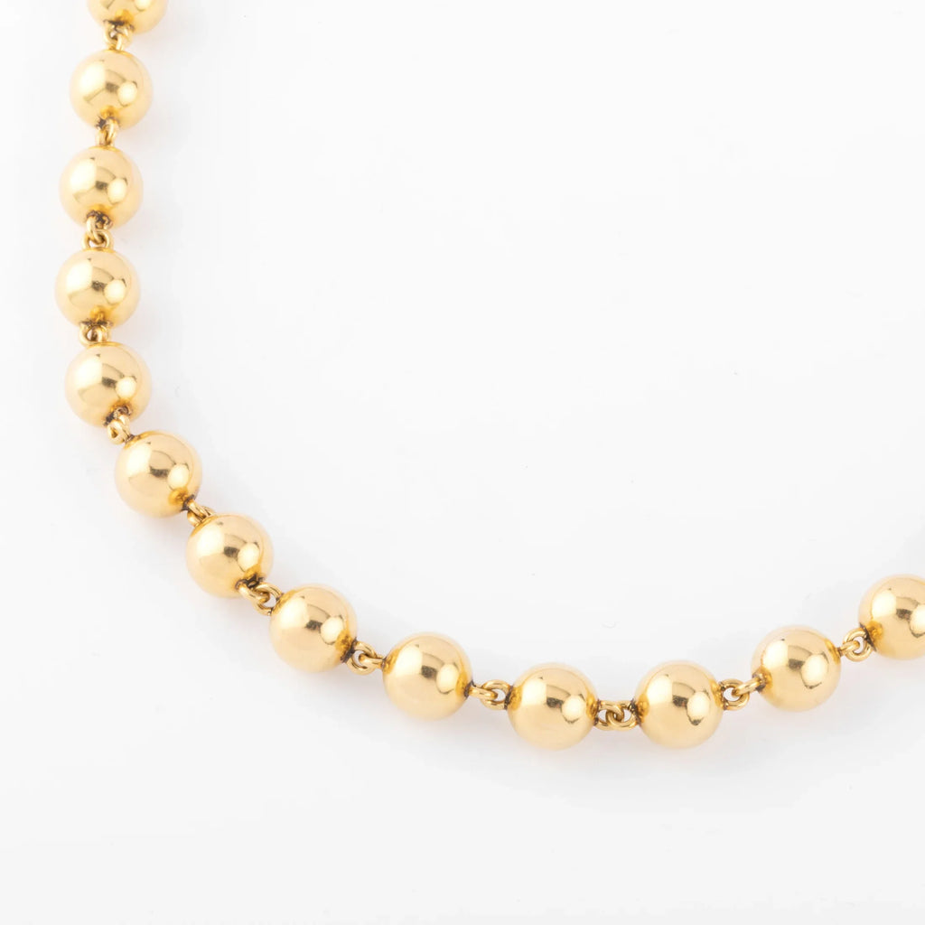 Marseillais yellow gold necklace adorned with gold beads