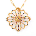 Pendentif et broche or jaune du créateur grec Lalaounis ornée de pierres précieuses