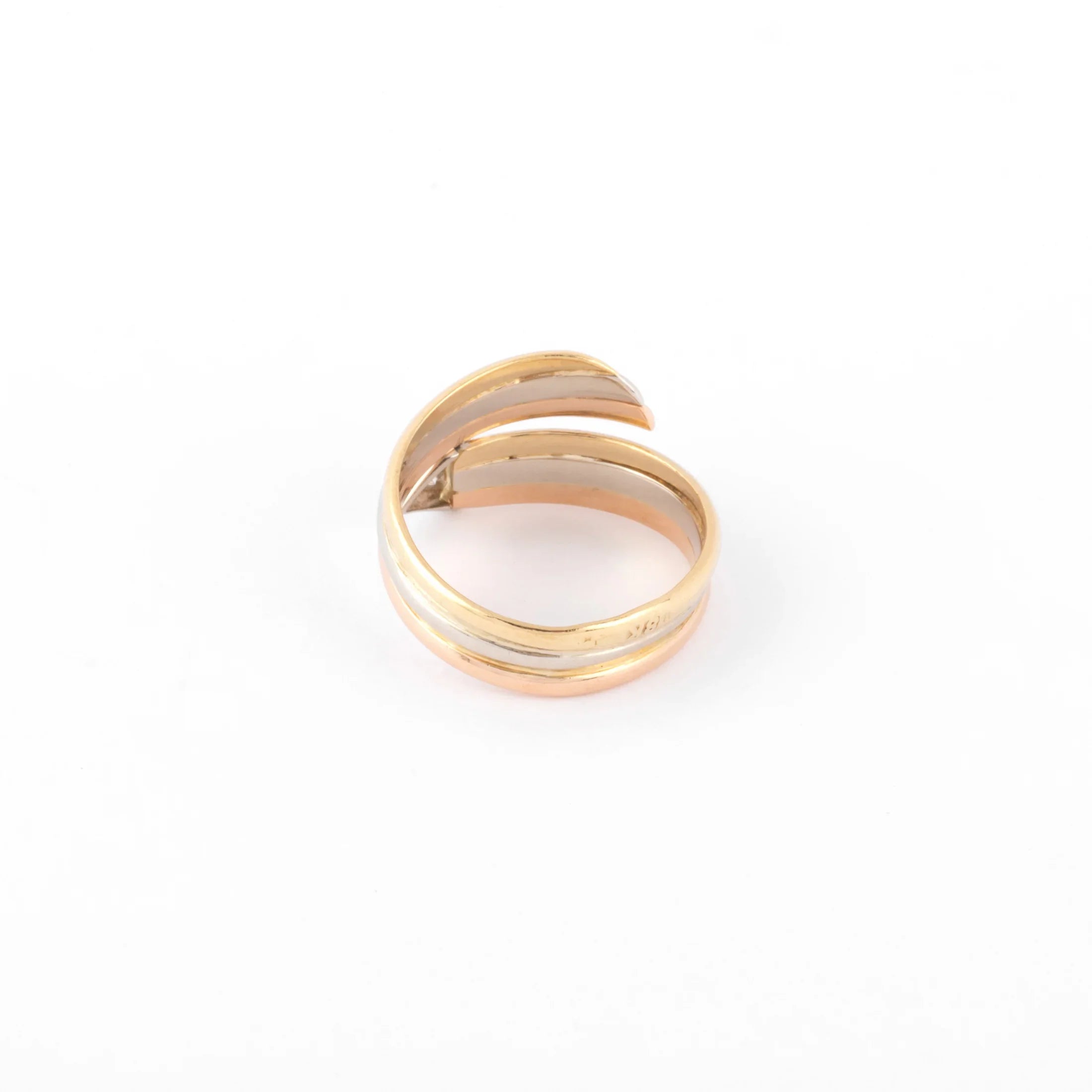 Three-gold ring with a diamond