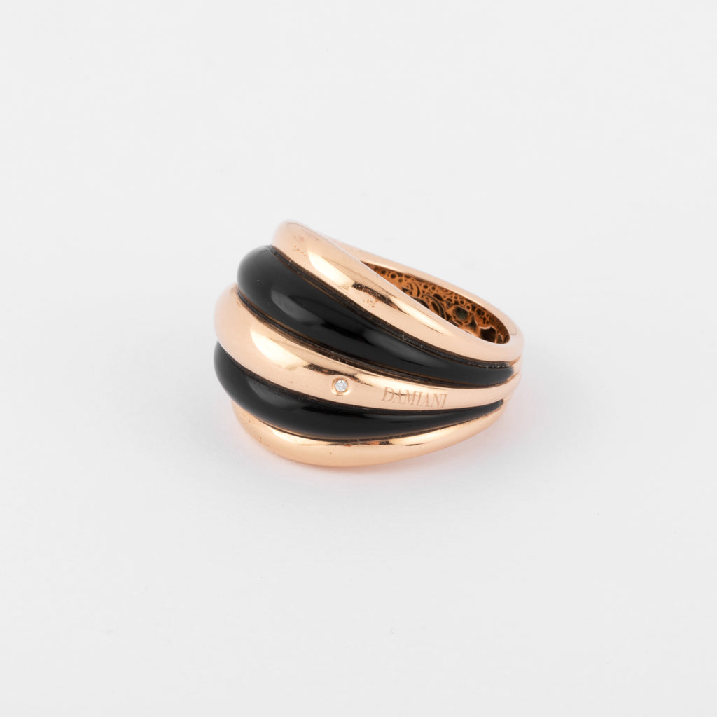 Damiani pink gold and onyx band ring