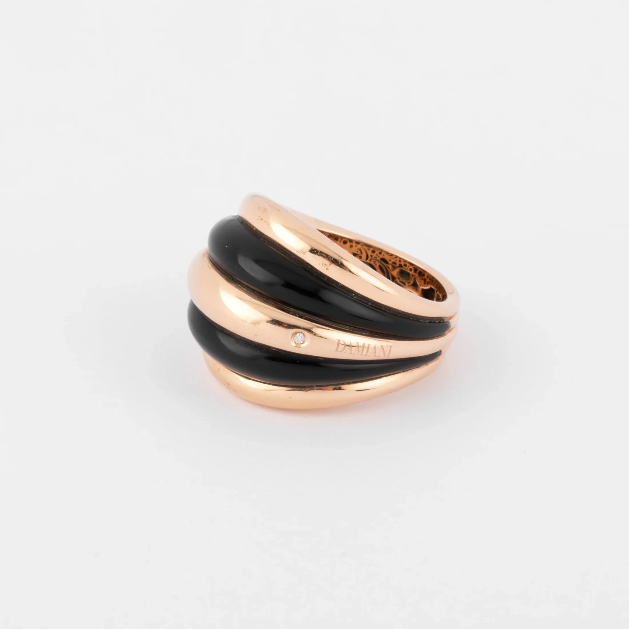Damiani pink gold and onyx band ring