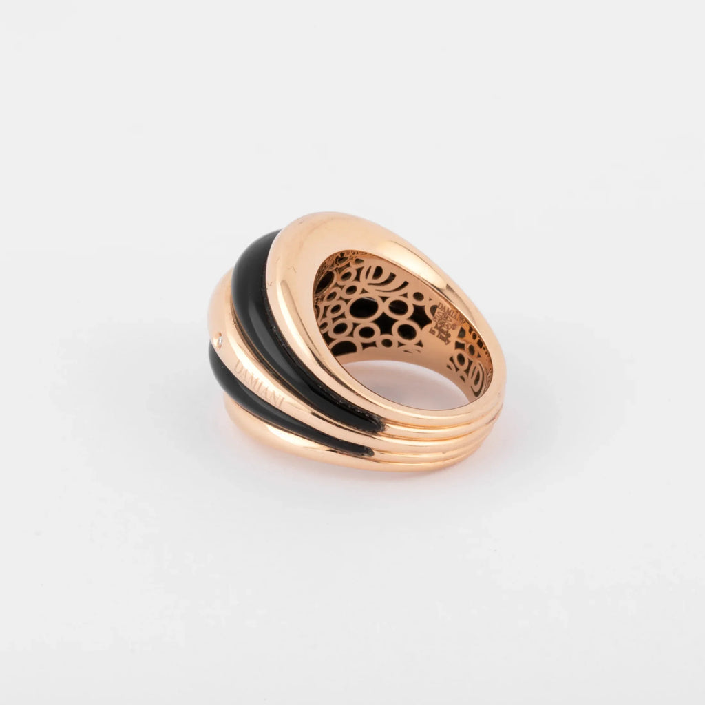 Damiani pink gold and onyx band ring