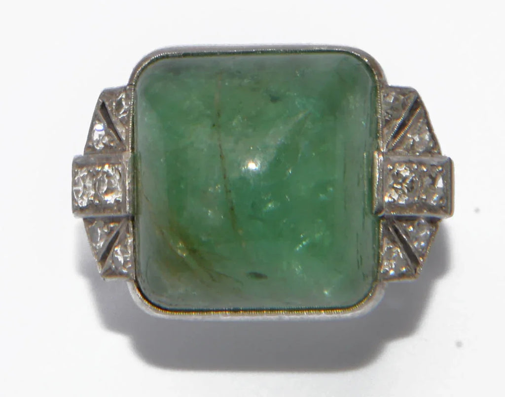Platinum and sugarloaf emerald ring