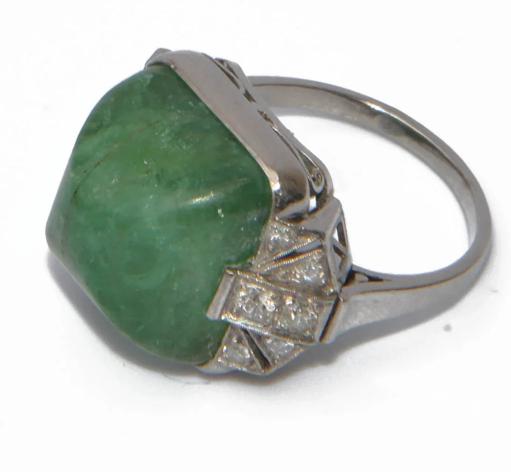 Platinum and sugarloaf emerald ring
