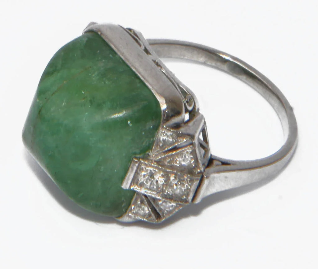 Platinum and sugarloaf emerald ring