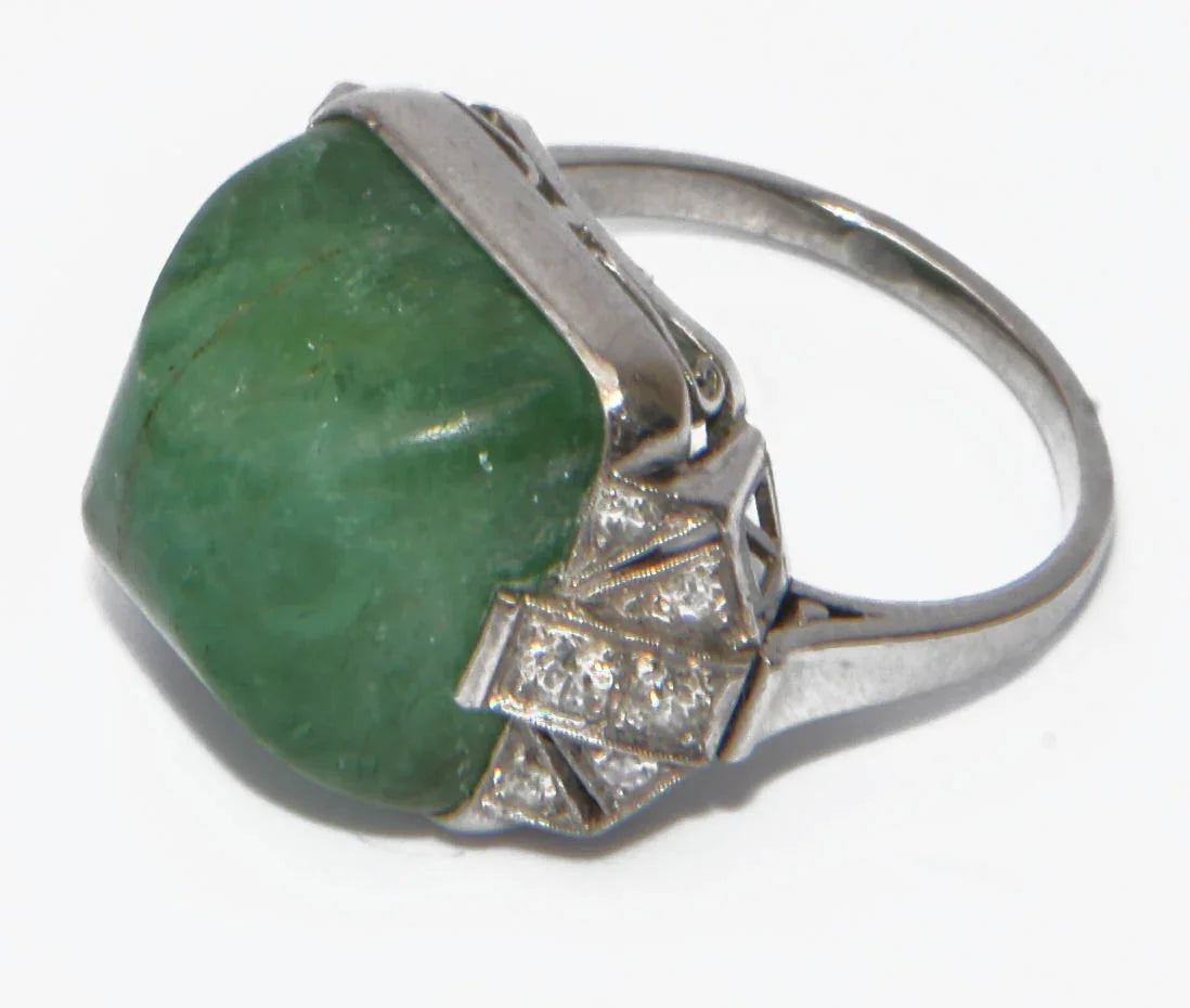 Platinum and sugarloaf emerald ring