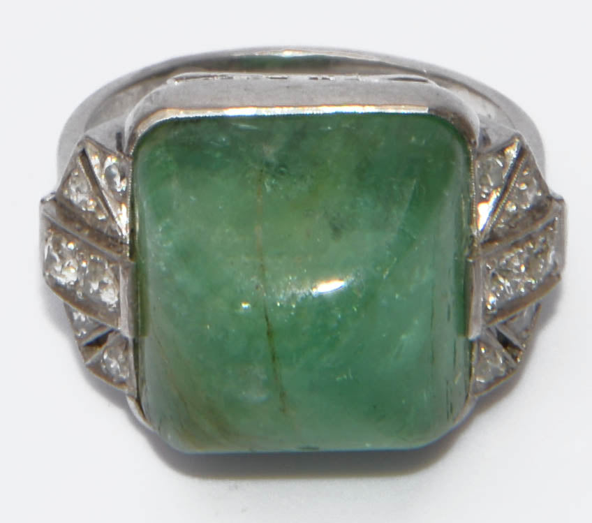 Platinum and sugarloaf emerald ring
