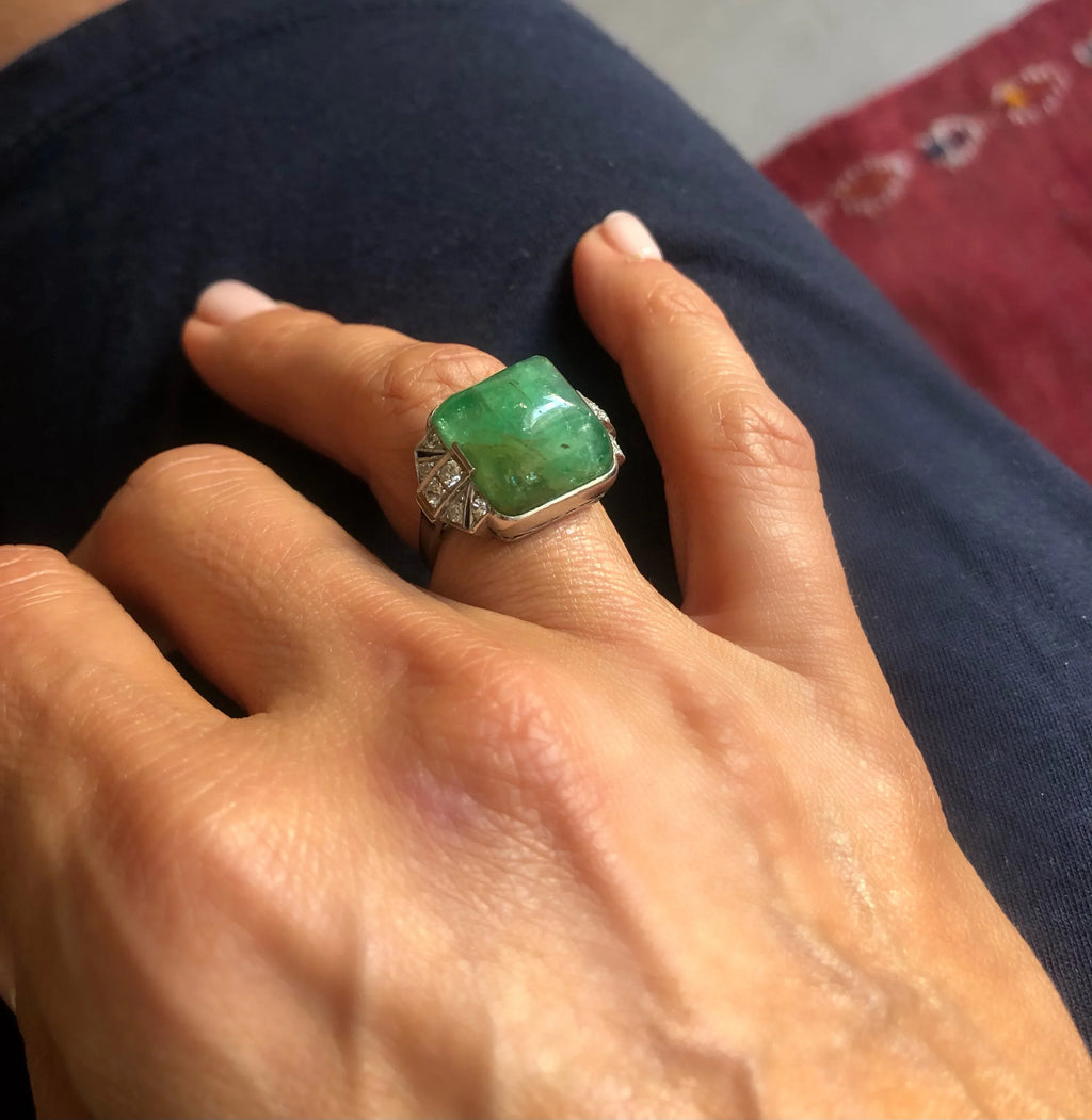 Platinum and sugarloaf emerald ring