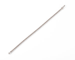 Bracelet ligne en diamant taille princesse sur or gris