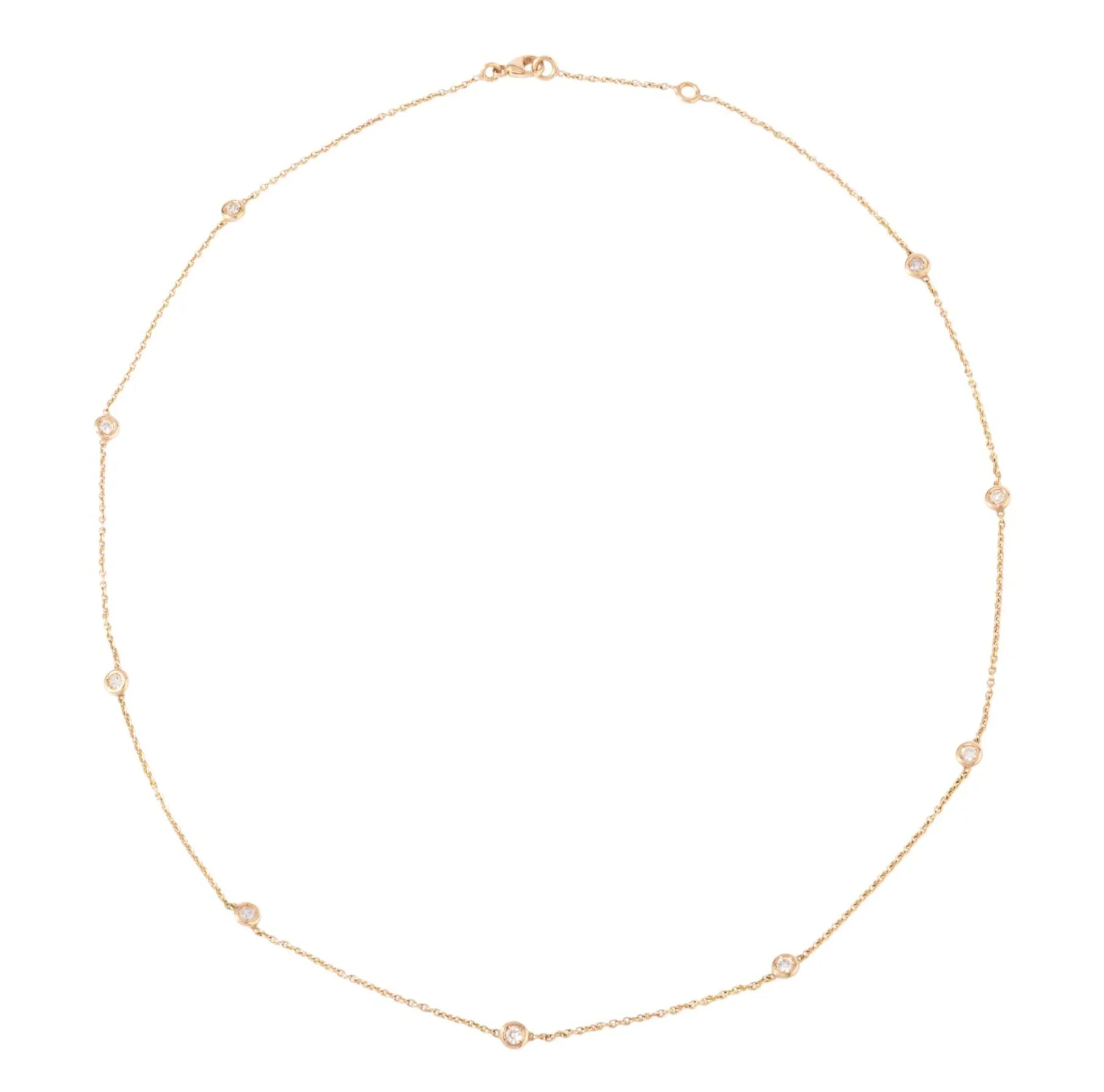 Yellow gold necklace with diamond-set links on a cable chain