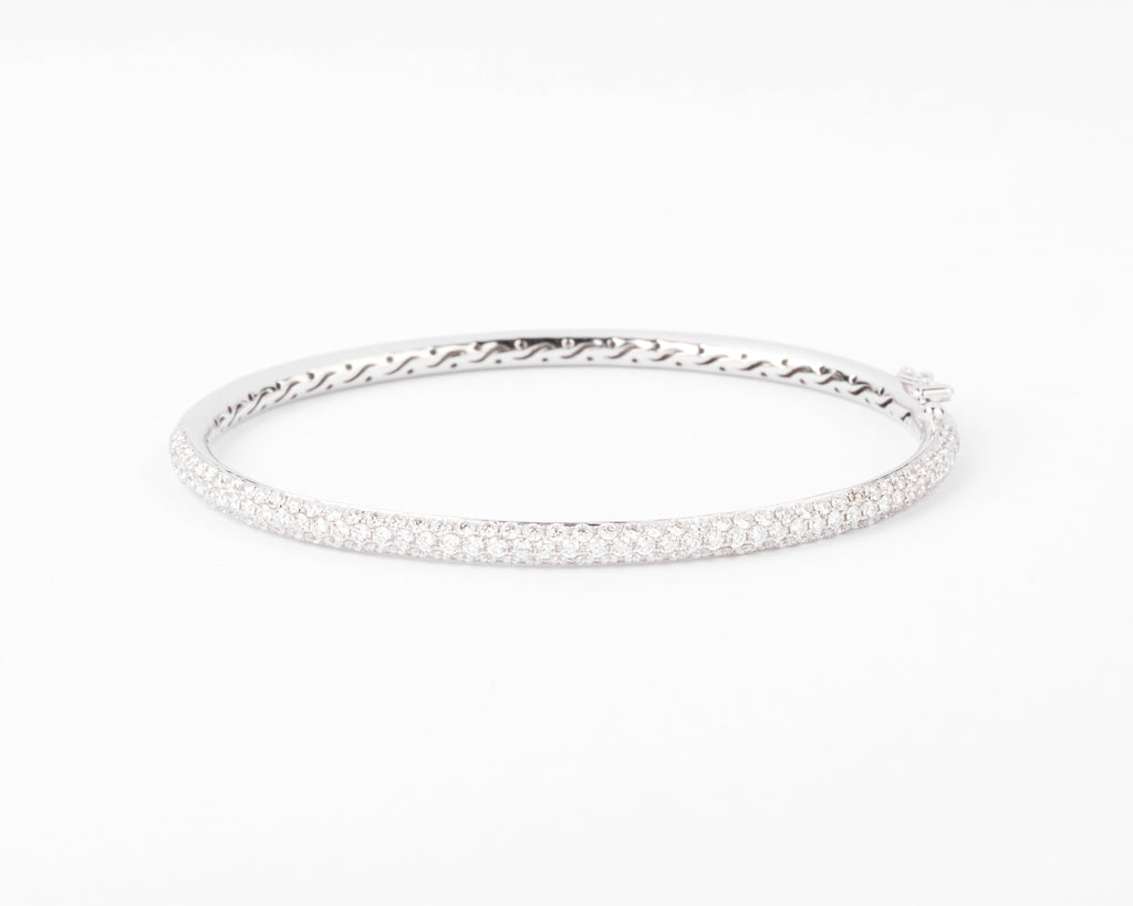 White gold bangle bracelet set with 3 rows of diamonds
