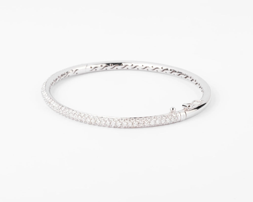 White gold bangle bracelet set with 3 rows of diamonds
