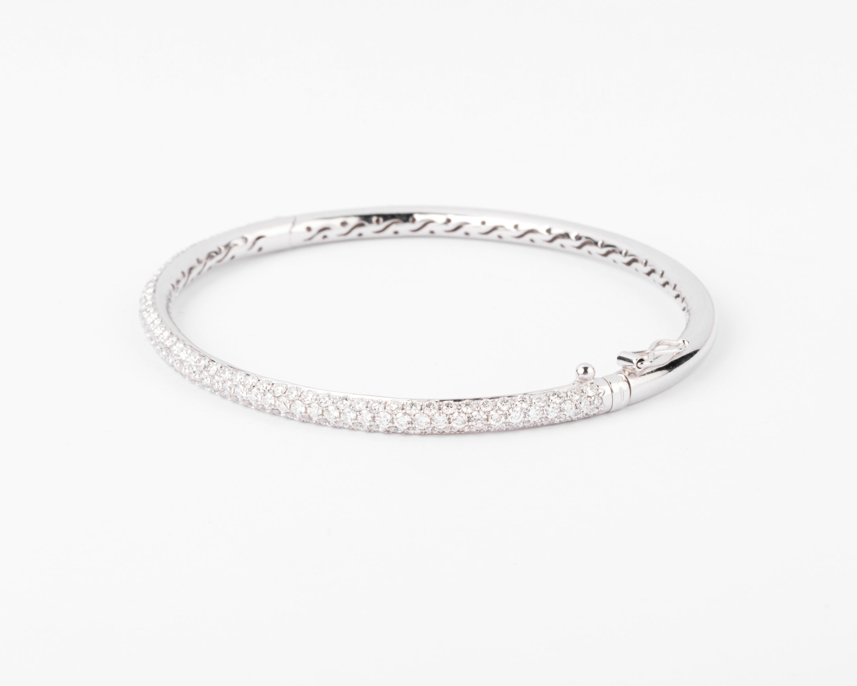 White gold bangle bracelet set with 3 rows of diamonds