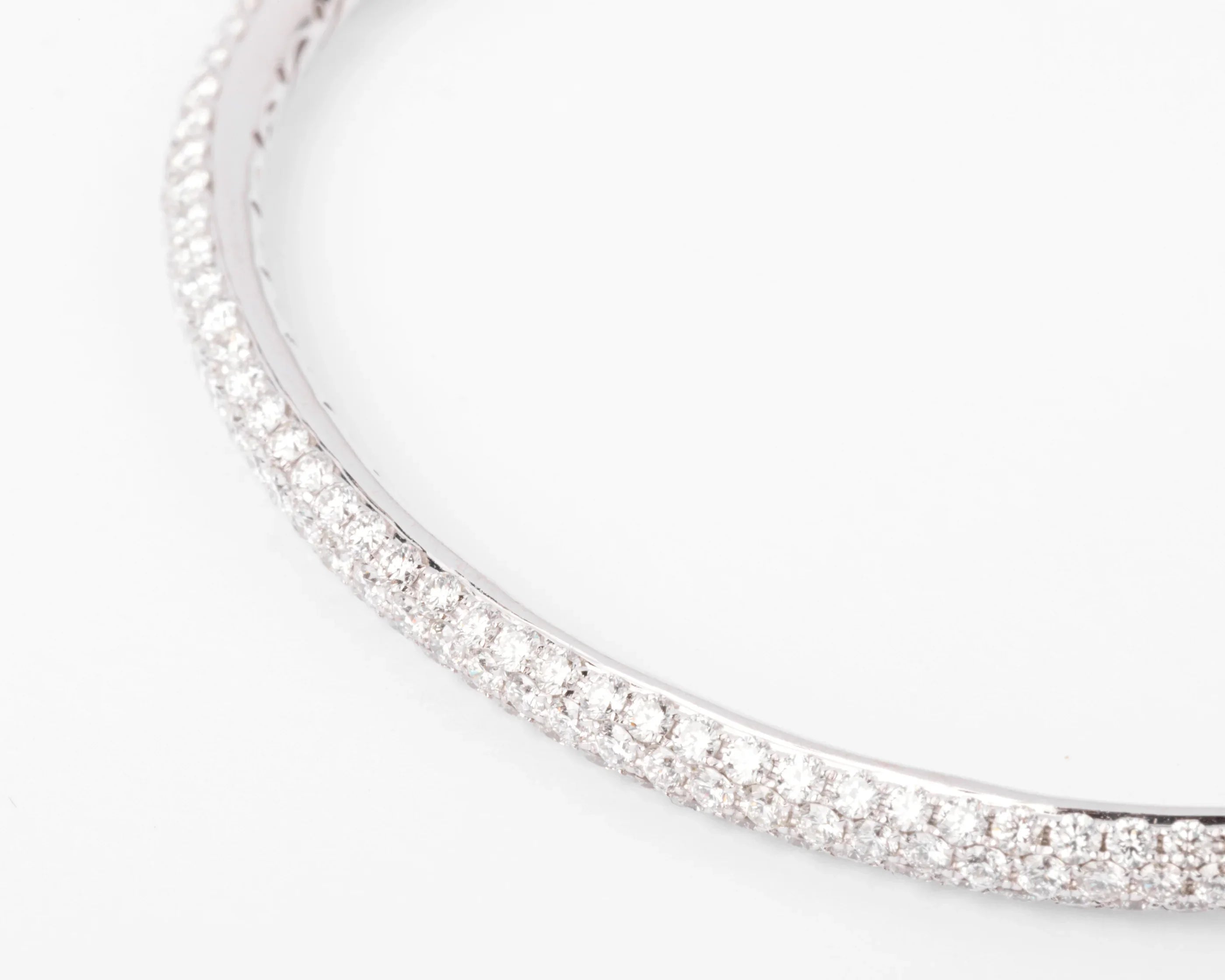 White gold bangle bracelet set with 3 rows of diamonds