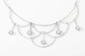 Collier or gris draperie en diamant