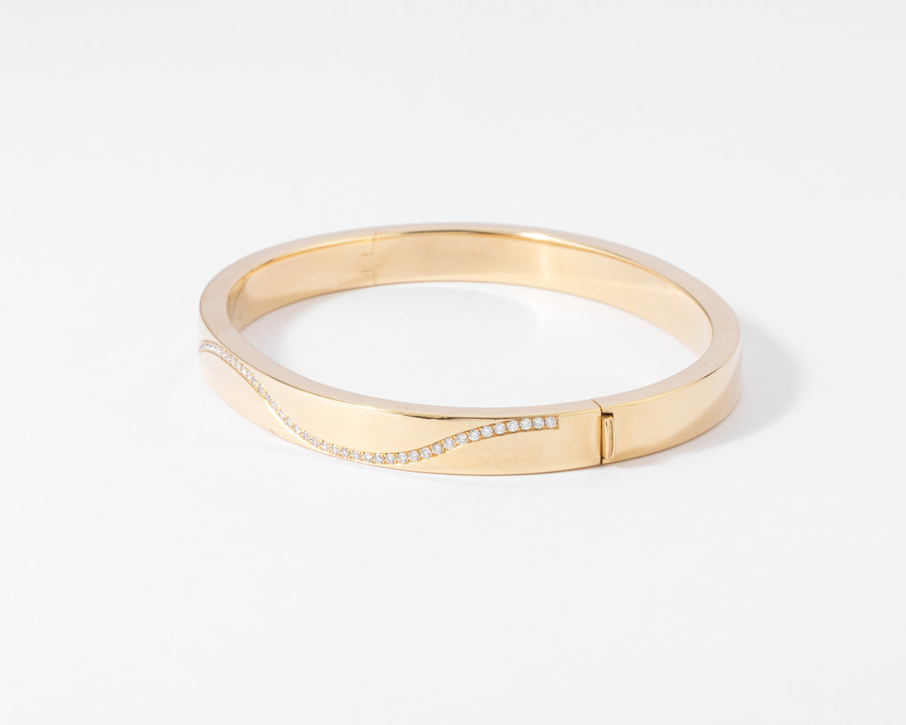 Yellow gold and diamond hinged bangle bracelet