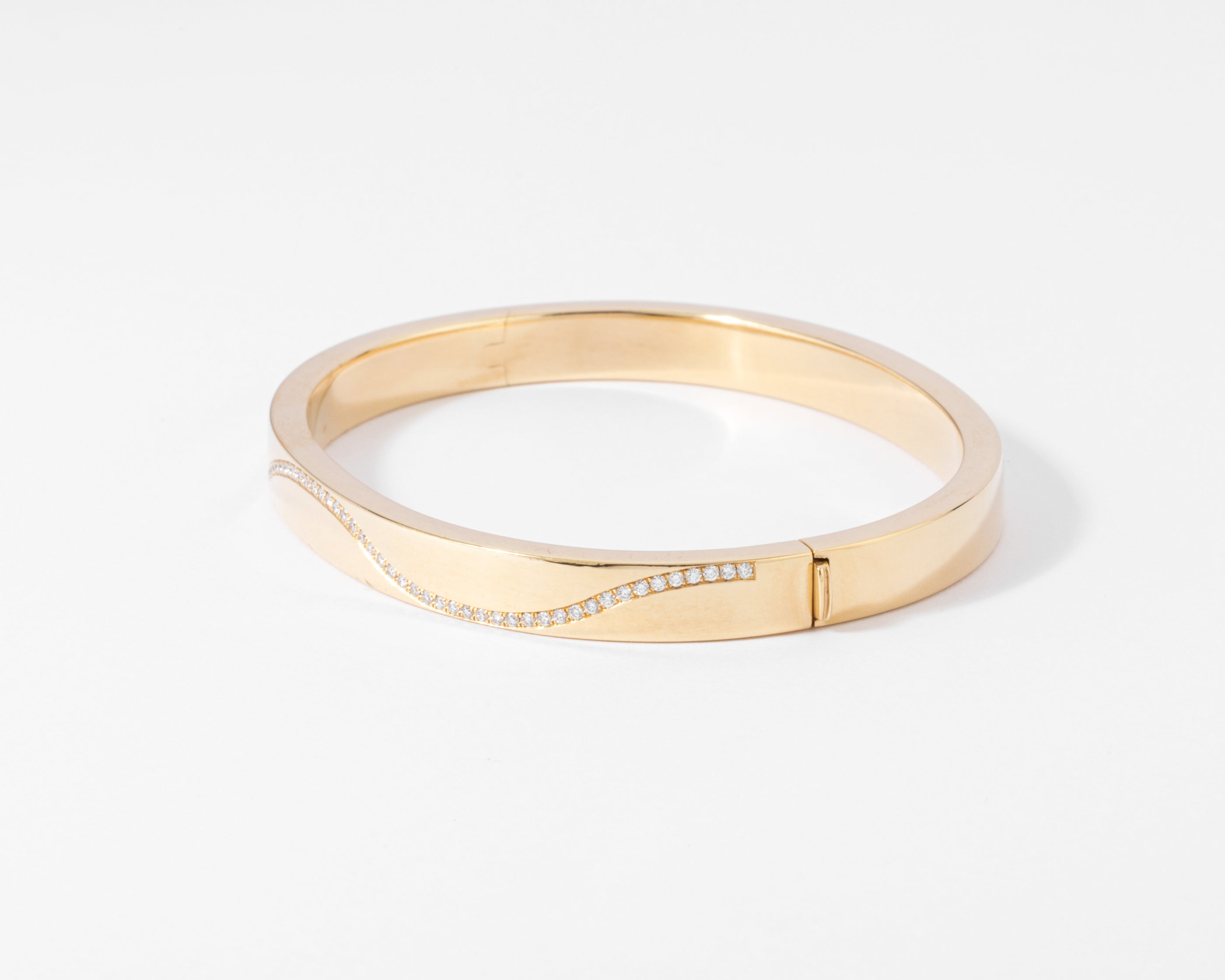 Yellow gold and diamond hinged bangle bracelet