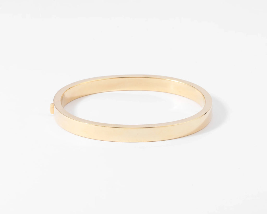 Yellow gold and diamond hinged bangle bracelet