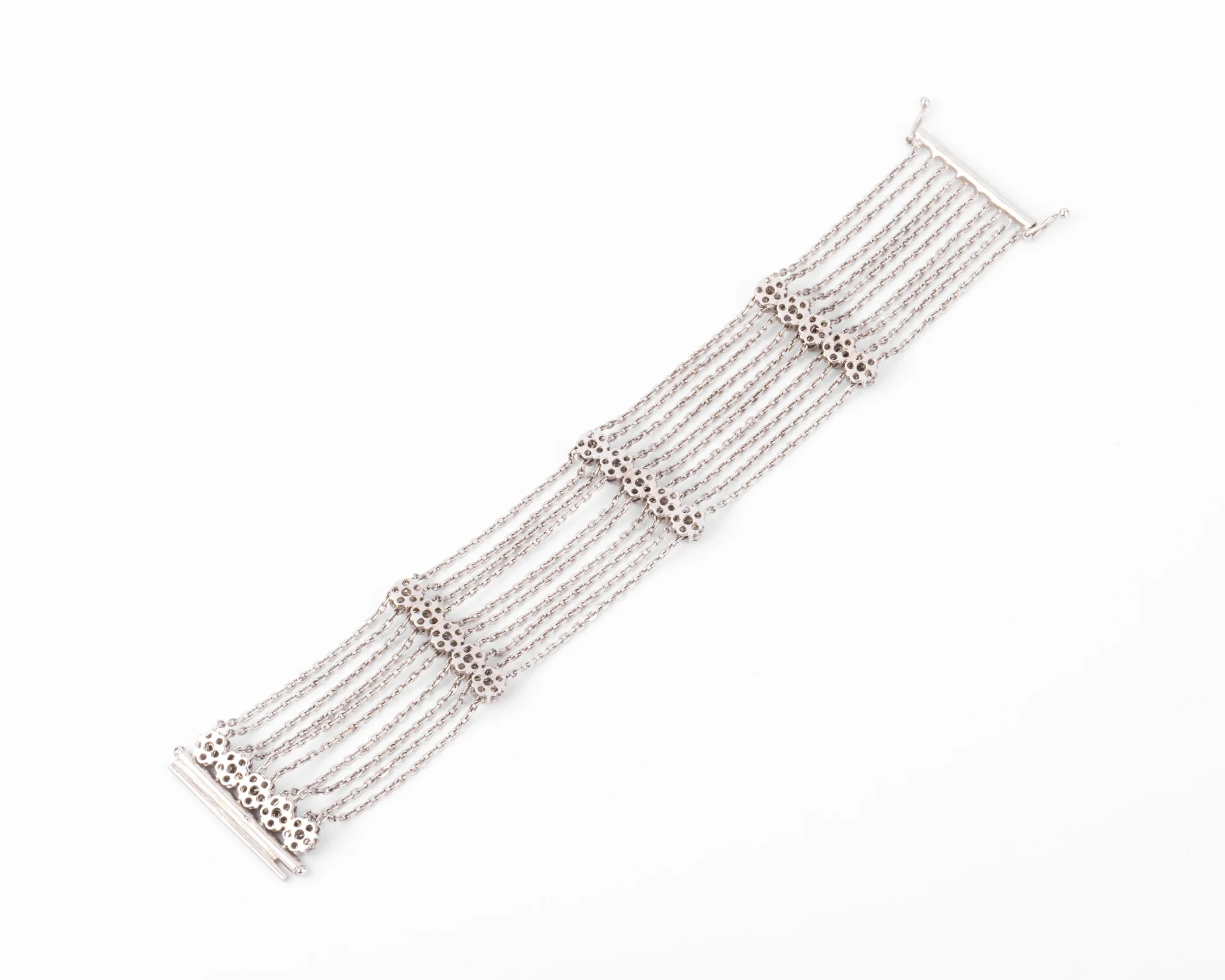 Bracelet or gris et diamant sur chaine força limée alternée de 4 motifs avec des fleurs