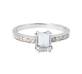 Rectangular ring adorned with an aquamarine