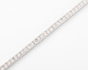 Bracelet ligne en diamant taille princesse sur or gris